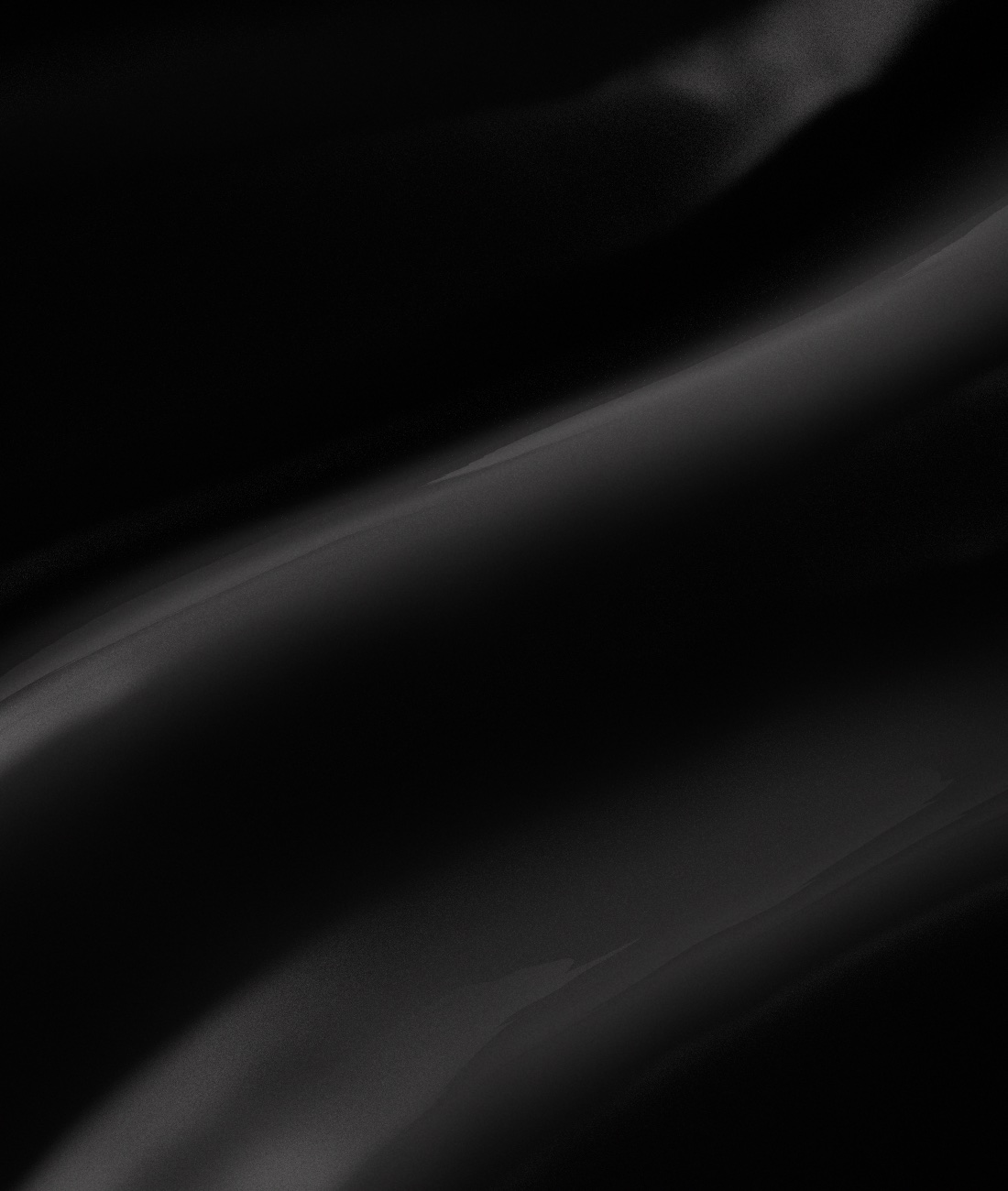 Liquid satin fabric folds catching the light